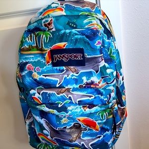 Incredibly ridiculous Jansport backpack with sharks, sloths, and palm trees